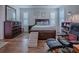 The Main bedroom features a dark wood bed frame and dressers at 3136 Vandenberg Ct, The Villages, FL 32163