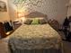 Inviting bedroom with a king-sized bed, side tables, and soft lighting creating a cozy retreat at 3205 Sonesta Ct # B, Clermont, FL 34711