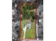 Expansive property featuring a private pool, mature trees, and a long driveway at 3380 Blossom St, Kissimmee, FL 34746