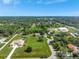 Expansive aerial view showcases the property's landscaping and neighborhood surroundings at 3380 Blossom St, Kissimmee, FL 34746