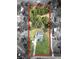 An aerial view showcasing the home with pool and spacious lot at 3380 Blossom St, Kissimmee, FL 34746