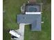 An aerial view showcasing the house, pool, landscaping, and driveway at 3380 Blossom St, Kissimmee, FL 34746