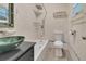 Bathroom with shower, bathtub and modern vanity with a decorative sink at 3380 Blossom St, Kissimmee, FL 34746