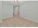Bright and airy dining area featuring tile flooring and neutral paint at 3380 Blossom St, Kissimmee, FL 34746