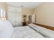 Comfortable bedroom featuring a neutral color palette, lots of storage and serene decor at 34021 Park Ln, Leesburg, FL 34788