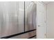 Stainless steel refrigerator and white doors inside of the kitchen at 34021 Park Ln, Leesburg, FL 34788