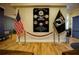 Lobby area with flags honoring Kings Ridge veterans past, present and future at 3706 Doune Way, Clermont, FL 34711