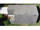 Aerial view of the roof showing its design and the surrounding landscaping of the property at 3706 Doune Way, Clermont, FL 34711
