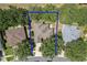 This aerial view shows the home and neighborhood highlighted with a blue border at 3732 Fallscrest Cir, Clermont, FL 34711