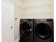 This laundry room has a new washer and dryer, with plenty of space at 3732 Fallscrest Cir, Clermont, FL 34711
