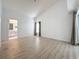 Large bedroom with a high ceiling, bathroom access and lots of natural light at 3821 Doune Way, Clermont, FL 34711