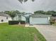 Charming single-Gathering home with manicured lawn and mature landscaping at 3821 Doune Way, Clermont, FL 34711