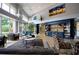 Inviting community lobby with stylish seating, plants and modern decor at 3821 Doune Way, Clermont, FL 34711