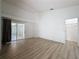 Spacious main bedroom with hardwood floors, ample closet space, and lots of light at 3821 Doune Way, Clermont, FL 34711