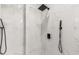 Detailed view of the shower showcasing the tile work and modern fixtures at 39634 Harbor Hills Blvd, Lady Lake, FL 32159