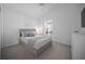 Cozy bedroom featuring neutral tones, a comfortable bed, and ample natural light at 4451 Elijah Loop, The Villages, FL 32163