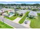 Aerial view of homes in a neighborhood with a pool at 4649 College Dr, Orlando, FL 32811