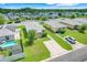 Aerial view of homes in a neighborhood with a pool at 4649 College Dr, Orlando, FL 32811