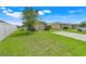 Well-kept front yard and a charming home exterior at 4649 College Dr, Orlando, FL 32811