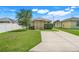 Well-kept front yard and a charming home exterior at 4649 College Dr, Orlando, FL 32811
