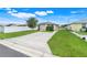 Well-kept front yard and a charming home exterior at 4649 College Dr, Orlando, FL 32811