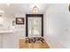 Bright entryway with wood floors, white trim, leading to living spaces at 467 Weston Manor Dr, The Villages, FL 32162