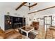 Comfortable living room featuring stylish furniture, a modern ceiling fan, and an open layout at 467 Weston Manor Dr, The Villages, FL 32162