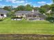 Spacious backyard with a pool, pergola, and plenty of room for outdoor activities at 4835 Calasans Ave, St Cloud, FL 34771