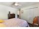 Bright bedroom with wood floors and ample closet space at 4835 Calasans Ave, St Cloud, FL 34771