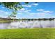 Breathtaking lake view from this property, perfect for relaxing and enjoying nature at 4835 Calasans Ave, St Cloud, FL 34771