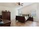 Spacious main bedroom featuring vaulted ceilings, tile floors, and ample natural light at 4835 Calasans Ave, St Cloud, FL 34771