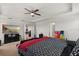 This spacious main bedroom has lots of natural light and connects to the ensuite bath at 4869 Grassendale Ter, Sanford, FL 32771