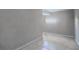 Hallway with tile flooring and unique lighting at 4976 Sandpiper Dr, Oxford, FL 34484