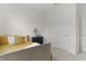 Comfortable bedroom featuring neutral decor and ample closet space at 5043 Stokes Way, Wildwood, FL 34785