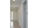 Bright entryway featuring tile floors, a door with sidelight, and neutral walls at 5045 Balsam Falls Rd, Deland, FL 32724