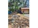 Spacious lot with a garage and workshop offering ample parking at 5643 County Road 173, Wildwood, FL 34785