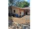 Detached garage with ample storage and workspace on a large lot at 5643 County Road 173, Wildwood, FL 34785