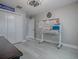 Office space with desk, computer, and storage closet at 5905 Caulk Ct, The Villages, FL 32163