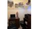 Office with desk, laptop, and shelving unit, ideal for remote work or studying at 66 Elmwood Trl, Deland, FL 32724