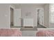 Shared bedroom showing twin beds with a dresser in between at 7627 Taormina Way, Clermont, FL 34714