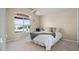 Bright bedroom with a large window that brings in natural light at 815 Cortez Ave, Lady Lake, FL 32159