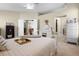 Relaxing primary bedroom featuring a decorative ceiling fan and access to en-suite bath at 815 Cortez Ave, Lady Lake, FL 32159