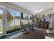 Sunroom with seating area and views of the backyard at 815 Cortez Ave, Lady Lake, FL 32159