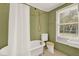 Charming bathroom with vintage fixtures and a classic clawfoot tub at 9023 Silver Lake Dr, Leesburg, FL 34788