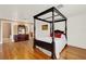 Bedroom with hardwood floors and windows with natural lighting at 9023 Silver Lake Dr, Leesburg, FL 34788