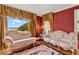 Elegant sitting room featuring decorative curtains, a view of the lake, and luxurious seating at 9023 Silver Lake Dr, Leesburg, FL 34788