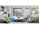 Bright and inviting living room with comfortable seating and a sliding door to the lanai at 453 Treviso Dr, Poinciana, FL 34759