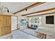 Bright bedroom with decorative ceiling, natural beams, and ample storage at 1007 N Shore Dr, Leesburg, FL 34748