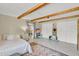 Spacious bedroom with patterned rug, closets, and tile floors at 1007 N Shore Dr, Leesburg, FL 34748