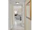 Inviting hallway with tiled floors leads to the living area and home interior at 1007 N Shore Dr, Leesburg, FL 34748